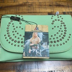 Very cute small cross body or clutch. New new